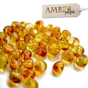 baltic amber loose beads for craftings polished in the champagne amber colour