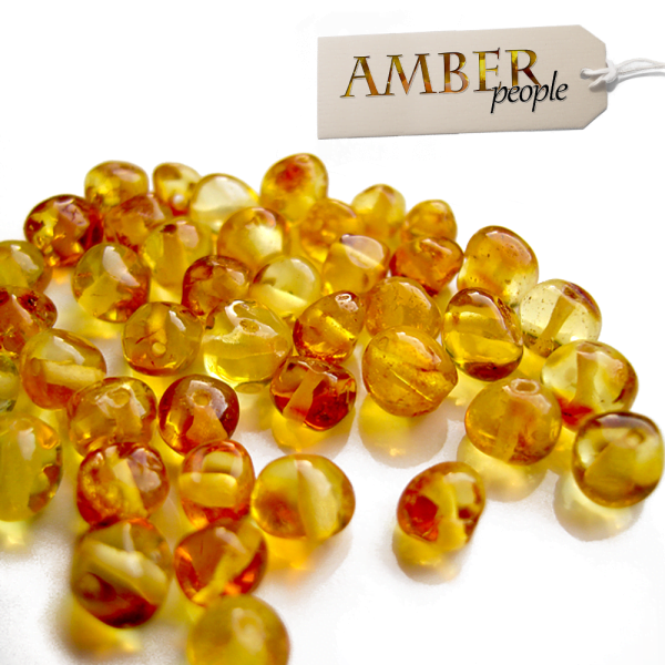 baltic amber loose beads for craftings polished in the champagne amber colour