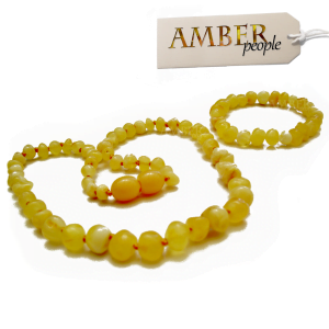 Baltic amber baby child teething necklace and bracelet set in rare butterscotch displayed in the main product image