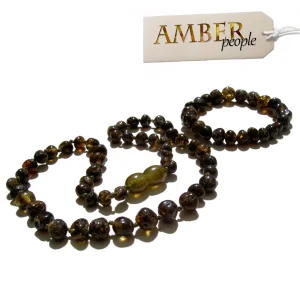 Baltic amber baby child teething necklace and bracelet set in rare dark green displayed in the main product image